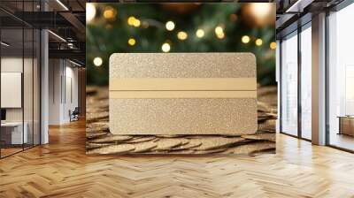 A glittery gold gift card displayed against a festive background. Wall mural