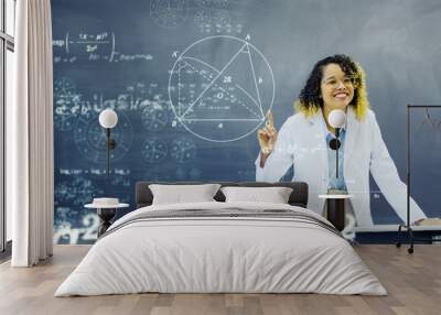 Black female teacher giving class and science education concept. Wall mural