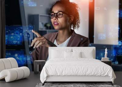 Black woman working in the office and digital technology concept. Wall mural