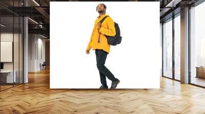 Full body photo of a black man looking up while walking. Full body photo PNG with transparent background precisely cut out with clipping path. Wall mural