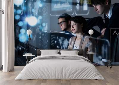 Group of people looking at the futuristic user interface. Wall mural