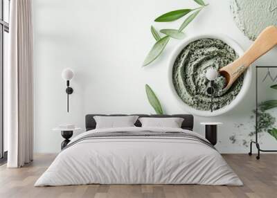 An exfoliating scrub infused with green clay and natural ingredients accompanied by a beauty mask showcased on a pristine white background encouraging self care indulgence Wall mural