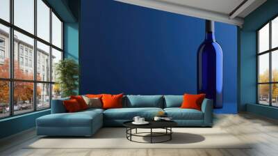 Blue wine bottle adrift in a blue backdrop Minimalist concept showcasing creativity Monochromatic design 3D rendering Wall mural