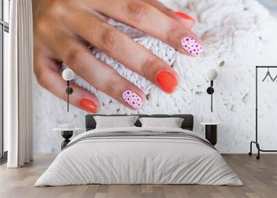 Nail art. Nail art on woman hands. Manicure or beauty concept. Selective focus included Wall mural