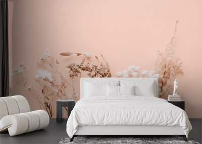 Romantic dried flowers on pink background. Wall mural