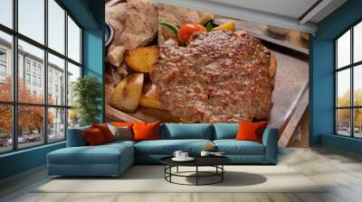 Bosnian Mix Grill PLJESKA, Two pieces of minced meat and served with Somun, Labnah (Kaymak), Bosnian sauce (Ajvar). Wall mural