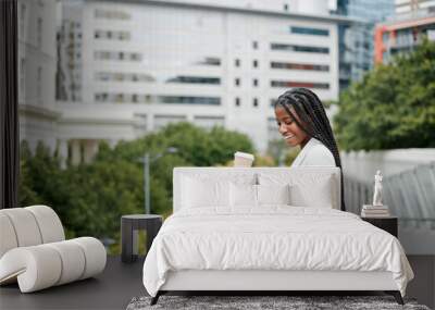 Black woman, digital tablet and coffee on a rooftop, work schedule and reading email while on break outdoor. Business woman, happy smile and funny online post or social media, morning and New york Wall mural