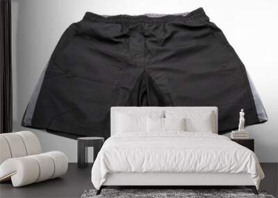 Black sports shorts isolated with white background. Concept of comfortable clothing. Wall mural