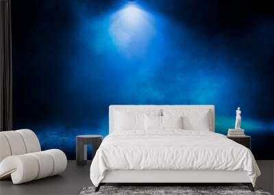 Blue misty dark background. Dark street with smoke, fog, blue spotlights, neon. Dark abstract empty background. Wall mural