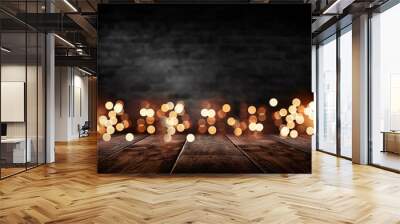 Empty dark room scene. Old brick wall and wooden floor. Blur bokeh lights. Abstract bokeh light. Night view Wall mural