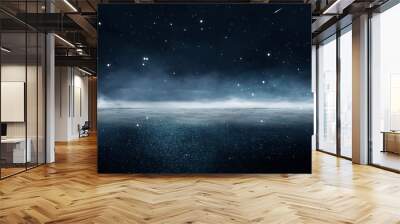 Empty night nature scene. The night starry sky, the rays of the blue neon spotlight. Snowy winter night background. Wall mural