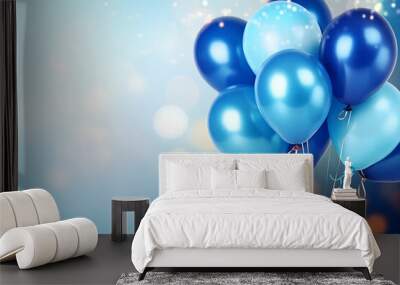 Blue Isolated birthday balloons on a blurred shiny blue background with space for text Wall mural