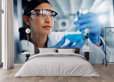 Woman, scientist and study chemical liquid, glass beaker and science chemistry experiment in lab. Female doctor with goggles, gloves and analysis of fluid, scientific innovation and medical research Wall mural