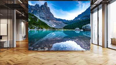 Beautiful reflections on turquoise Sorapis lake and with dito di dio in the background in the evening. Lake Sorapis, Dolomites, Belluno, Italy, Europe. Wall mural