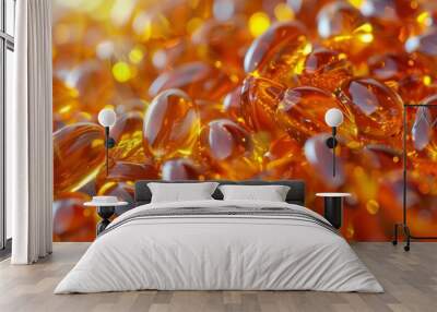 Closeup of shiny golden fish oil capsules reflecting light Wall mural