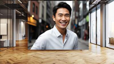 Confidently Smiling Trendy Asian Man Captured in Charming Portrait Wall mural