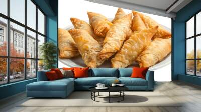 Delicious indian samosas with crispy crust on white plate, isolated on transparent background. Versatile for design purposes Wall mural