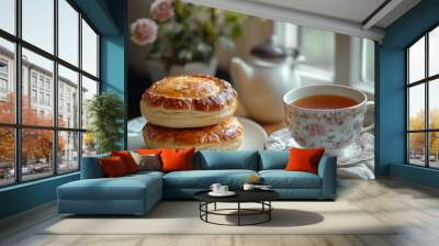 Delicious sweet homemade pastry buns being served with tea Wall mural