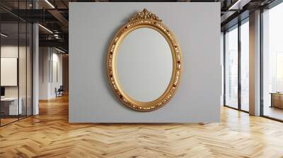 Elegant Vintage Oval Gold Mirror Frame with Decorative Embellishments on Isolated Background Wall mural