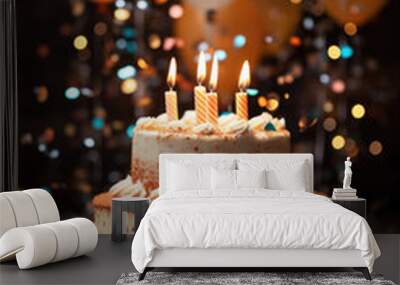 Festive birthday cake with candles against a background of bokeh and balloons Wall mural