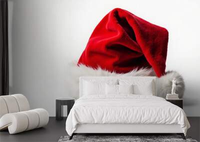 Festive Santa Hat on White Background: Perfect for Holiday Marketing, Retail Promotions, and Seasonal Greetings Wall mural