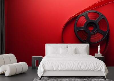 Film reel on a vibrant red background Wall mural