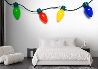 Colorful Christmas lights on a white background Wall mural