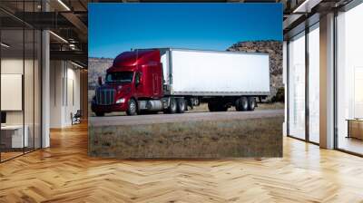 Eighteen wheel big rig tractor with trailer on highway. Trucking industry Wall mural