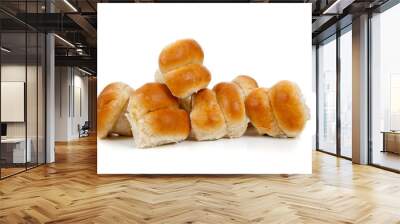 Golden baked dinner rolls on a white background Wall mural