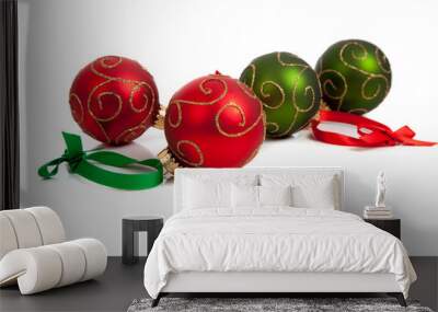 Red and Green Christmas ornaments with ribbon on white Wall mural