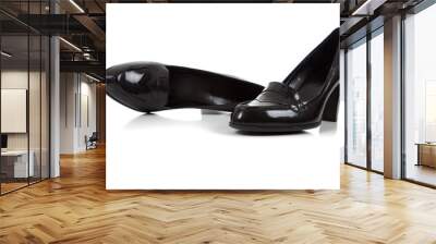 Women's black dress shoes on a white background Wall mural