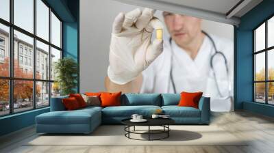 healthcare and medical concept - doctor with pill in hospital Wall mural