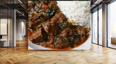 Hearty presentation: traditional beef stew and vegetables with fluffy white rice on a white plate Wall mural