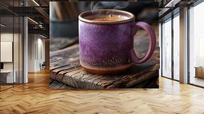 Heating hot coffee on a worn out timber table in a rustic purple mug Wall mural