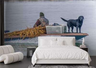 hunting dog on a boat Wall mural