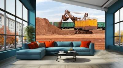 large excavator loads rock with iron or bauxite mining Wall mural