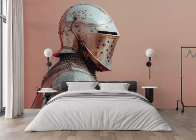 Medieval knight wearing weathered armor looking ahead Wall mural