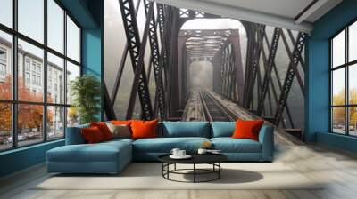 Abandoned train bridge with fog in the back, Pemi River, New Hampshire Wall mural