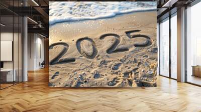 Soft sand etched with 2025 on a beach, wave washing over it, golden light creating a serene atmosphere for a relaxing vacation in a tropical paradise Wall mural