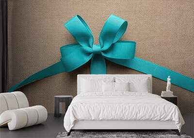 Teal Grosgrain Ribbon with Perfect Bow for Charity Event and Community Gathering on Textured Backdrop Wall mural