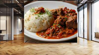 Traditional kenyan meal with delicious beef stew, creamy white ugali, and fresh herbs on a rustic wooden table Wall mural