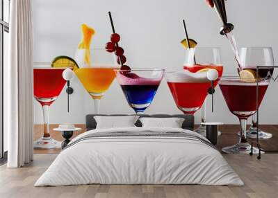 Vibrant Cocktail Glasses Cheers with Frothy Splash on White Background Wall mural