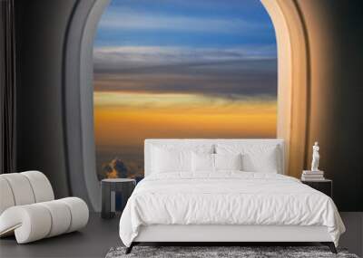 Window Seat in an airplay during a sunrise  Wall mural