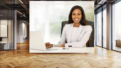 african american business woman using laptop computer Wall mural