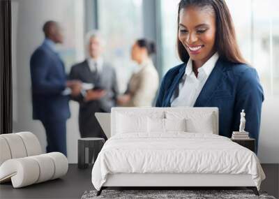 african american businesswoman using laptop Wall mural