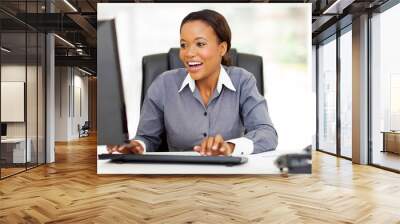 african american businesswoman working in office Wall mural