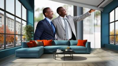 african business men pointing Wall mural