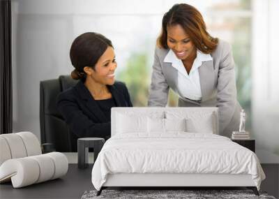 african business women working on a computer Wall mural