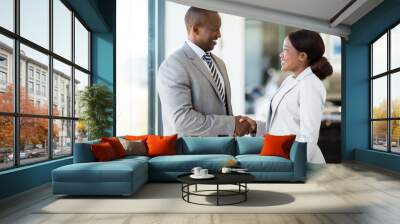 african car dealer handshake with customer Wall mural