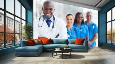 african medical doctor and colleagues in hospital Wall mural